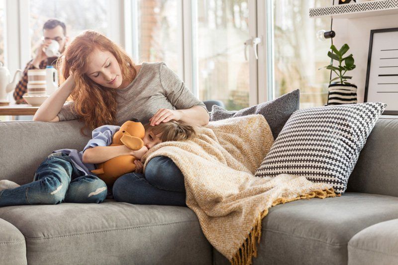 Mother taking care of child in Medford, OR A family in need of a bankruptcy lawyer that serving Jacksonville, OR