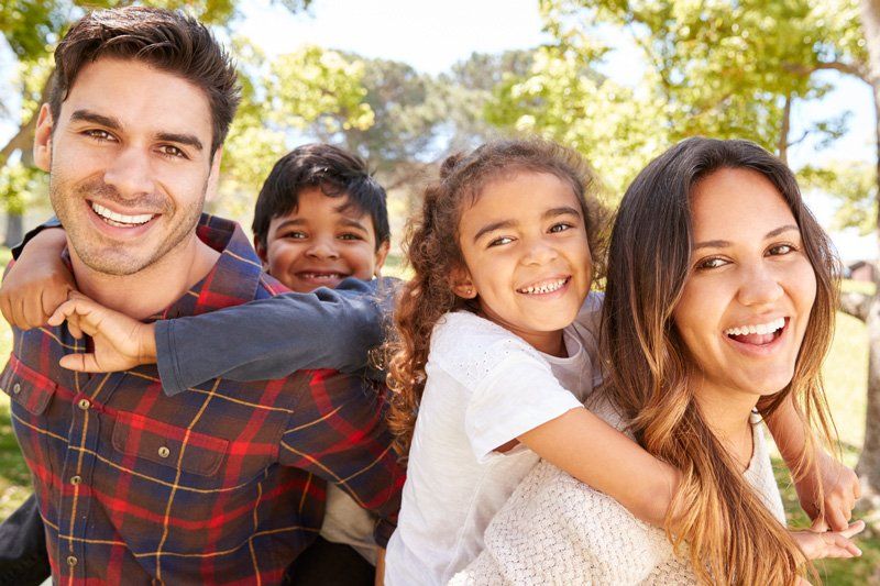 Happy Family — Attorney in Medford, OR A family involved with a probate lawyer serving Central Point, OR