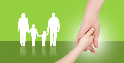 a family walking and holding hands