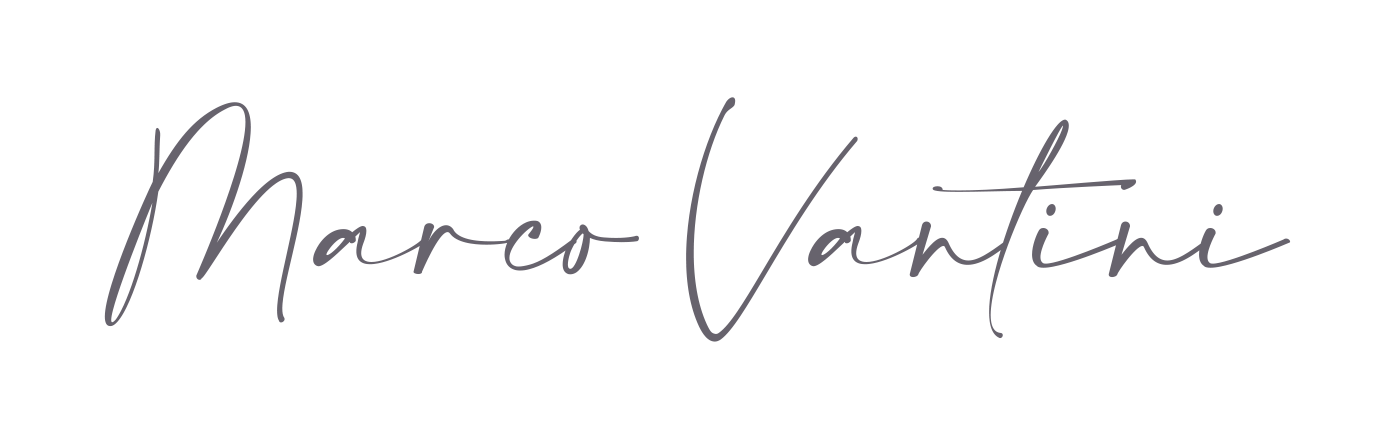 Il nome Marco Vantini è scritto in corsivo su fondo bianco.
