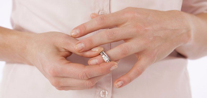 lady removing ring
