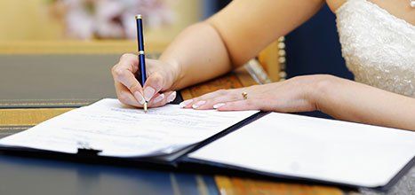 lady signing agreement