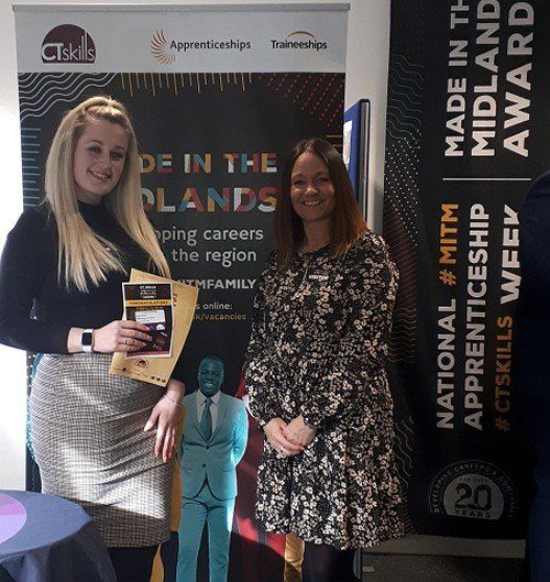 Megan receiving award with Laura