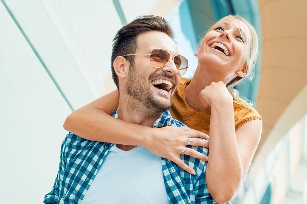 young couple smiling together