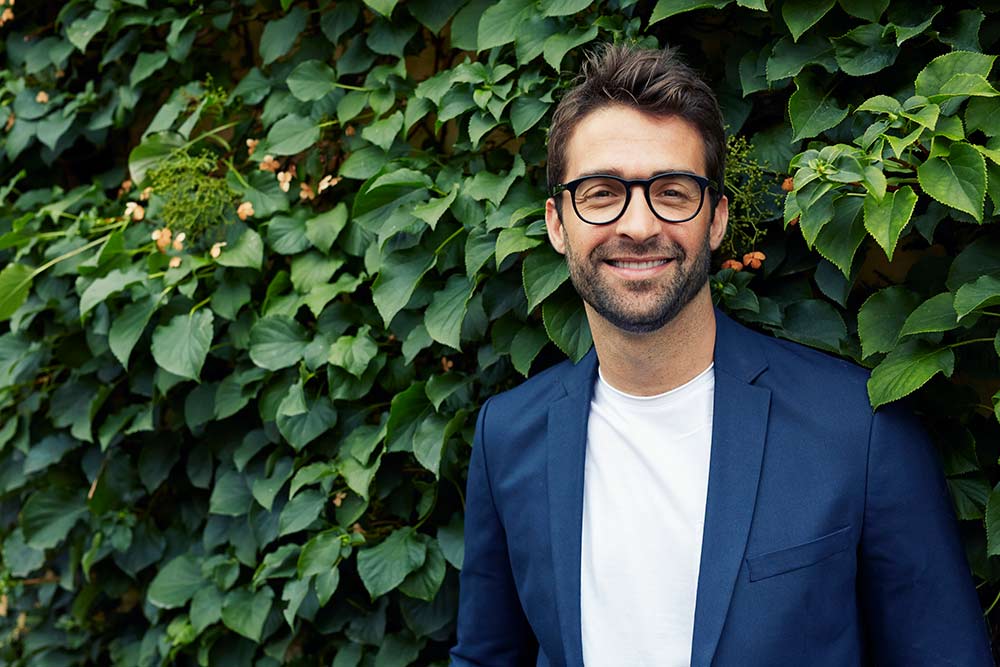 smiling guy with glasses