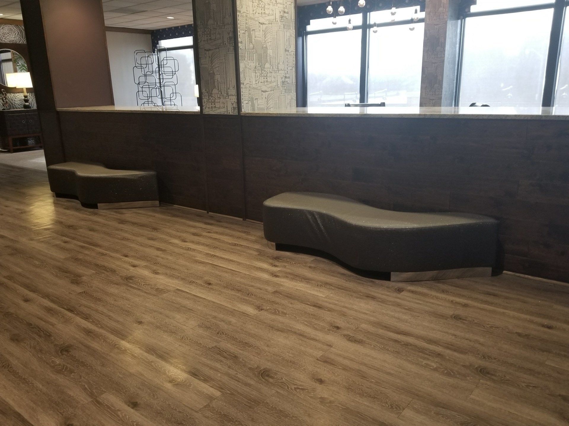 lobby decor benches clad with wood on low wall and floor by dismantle furniture