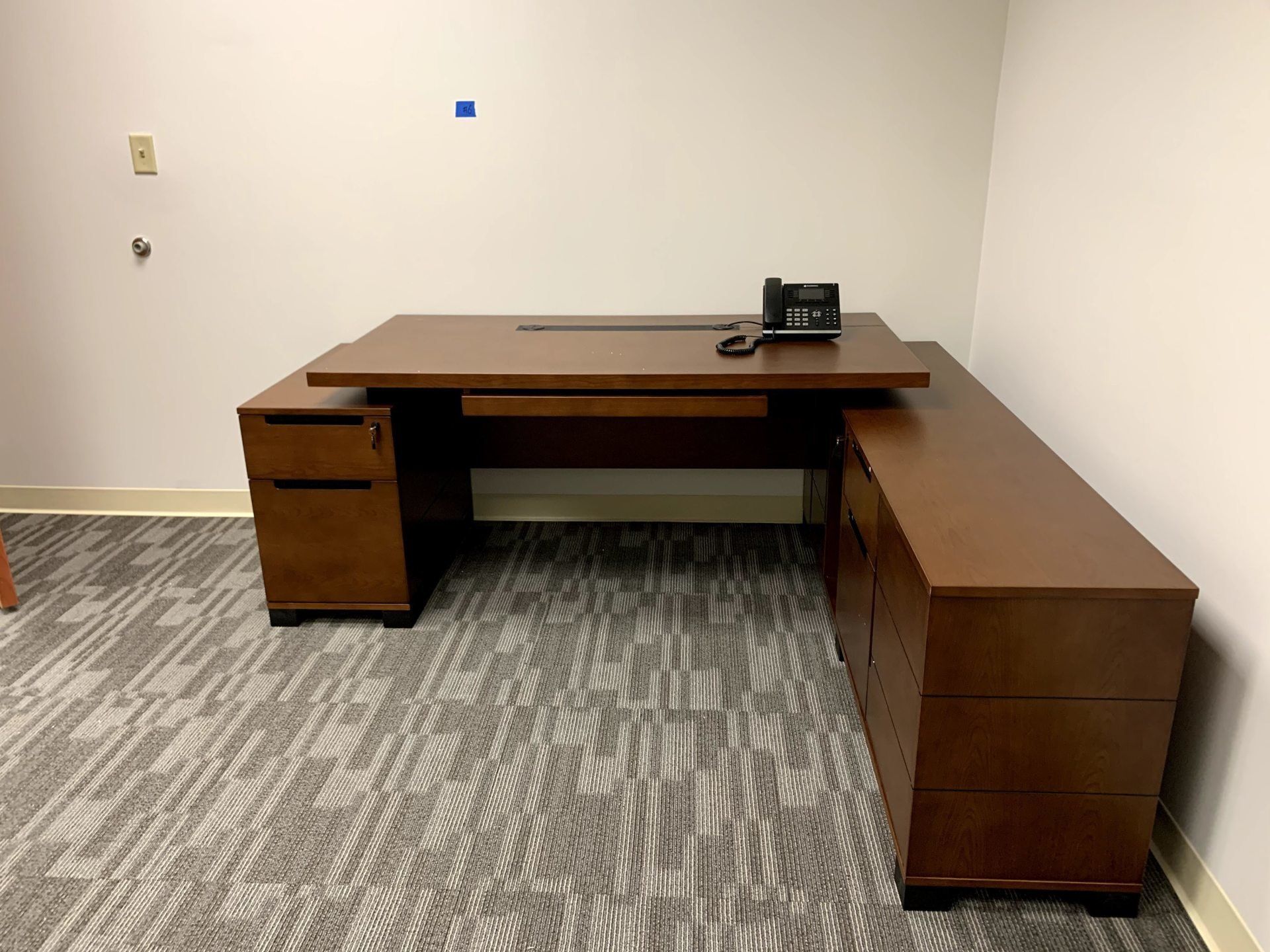 brown zuri ford desk with right turn by furniture assembly team