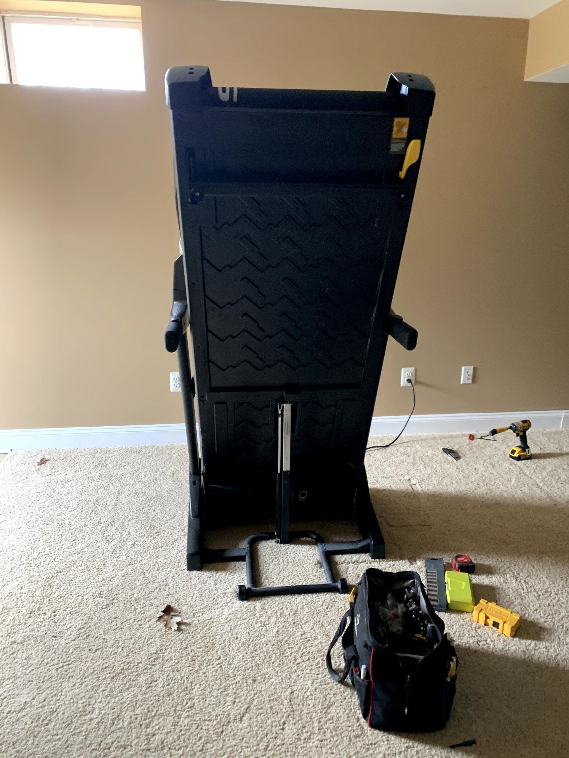 NordicTrack adjustable treadmill folded assembled by dismantle furniture