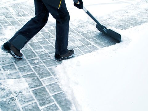 Snow Removal — Man Clearing Snow in Louisville, KY Snow Removal — Man Clearing Snow in Louisville, KY