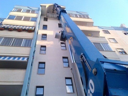 Ristrutturazione edile con piattaforma aerea