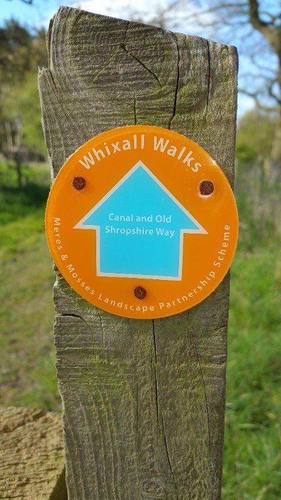Way marker of Whixall Walks on a gate post