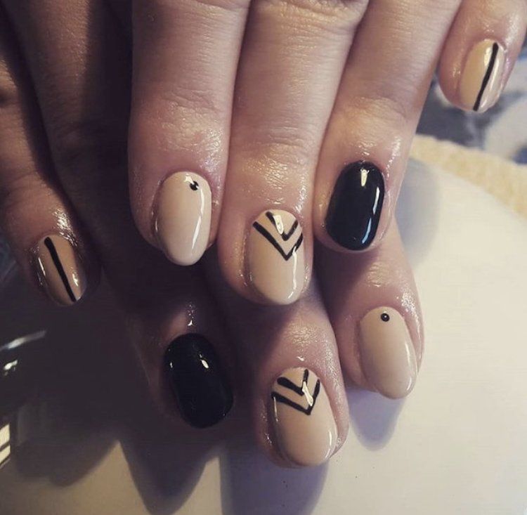 a hand showing painted nails
