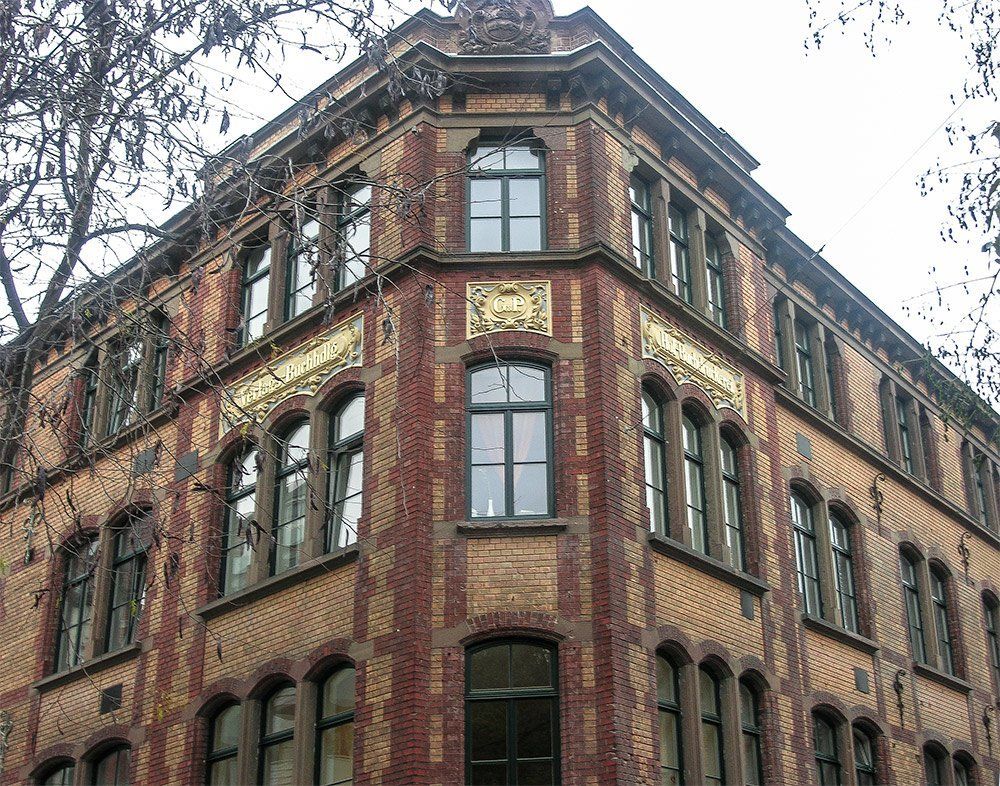 A large brick building with a lot of windows