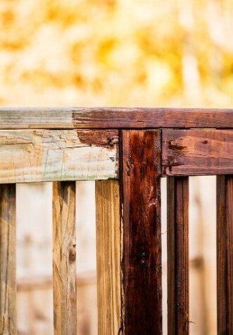 Midway through Staining deck railing