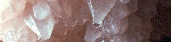 A close up of a waterfall in a cave.