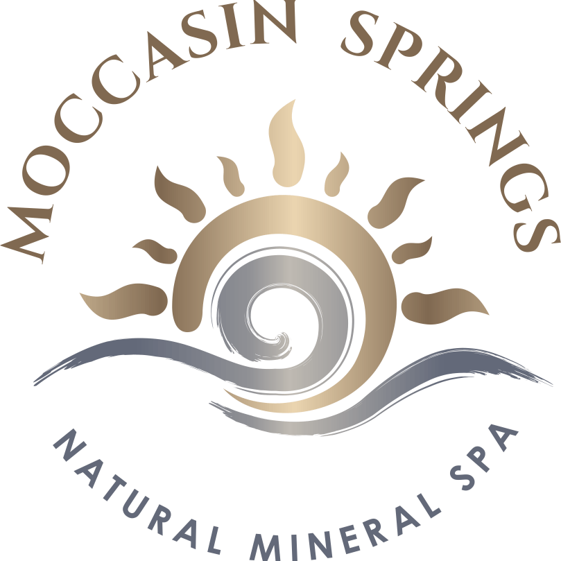 A logo for moccasin springs natural mineral spa