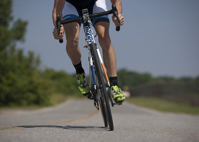Man Bicycling