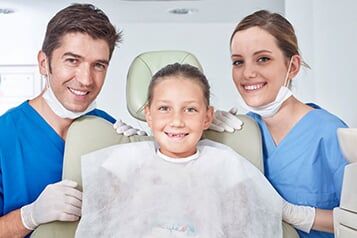 Kid with Dental Staff - Valley Oral Surgeon LTD in Johnstown, PA Kid with Dental Staff - Valley Oral Surgeon LTD in Johnstown, PA