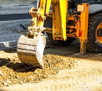 Excavator working outside - excavation in Sioux Rapids ,IA Excavator working outside - excavation in Sioux Rapids ,IA