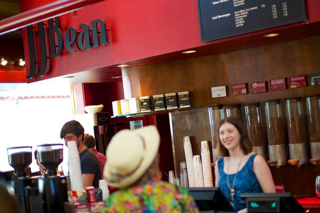Customer ordering coffee in a local coffee shop