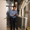 Furnaces — Man In Heating System in Hickory, NC Furnaces — Man In Heating System in Hickory, NC