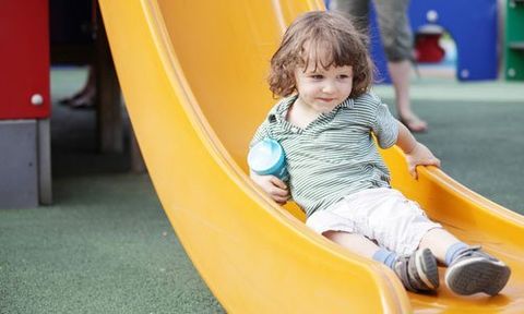 a kid sliding