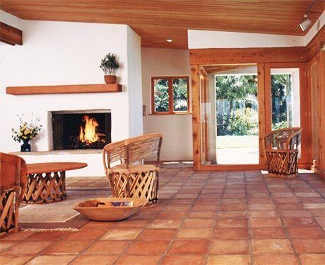 Saltillo and Talavera tile flooring steps that lead up to a front door.