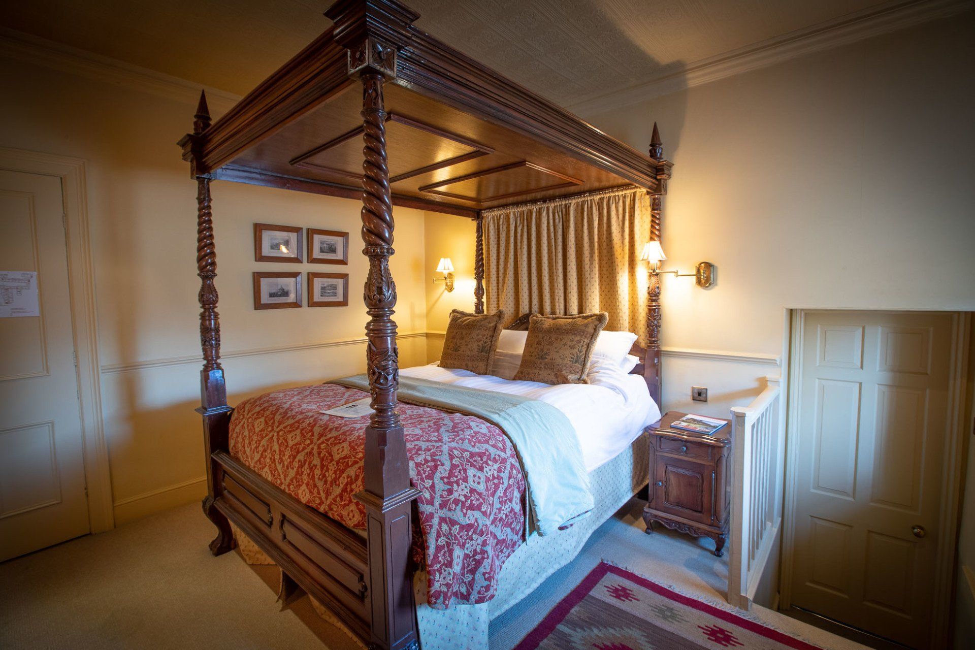 There is a four poster bed in the room.