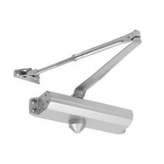 A close up of a door closer on a white background.