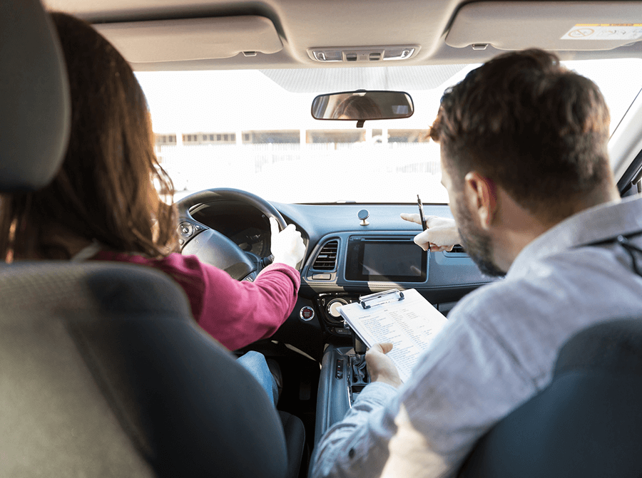 Instructor Guiding the Student to Drive — Brooklyn, NY — Bath Beach Driving School, Inc Instructor Guiding the Student to Drive — Brooklyn, NY — Bath Beach Driving School, Inc