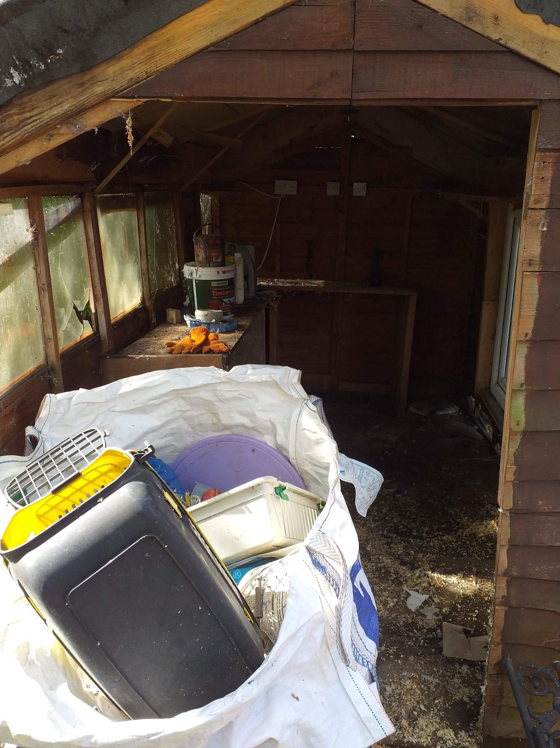 hand sorting on site a shed clearance