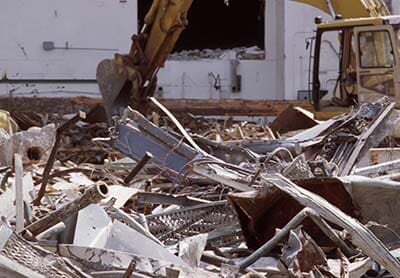 Excavator Demolishing House — Demolition in Sewel, NJ Excavator Demolishing House — Demolition in Sewel, NJ