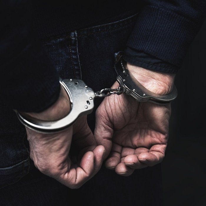 A criminal lawyer’s client handcuffed in Mills, WY