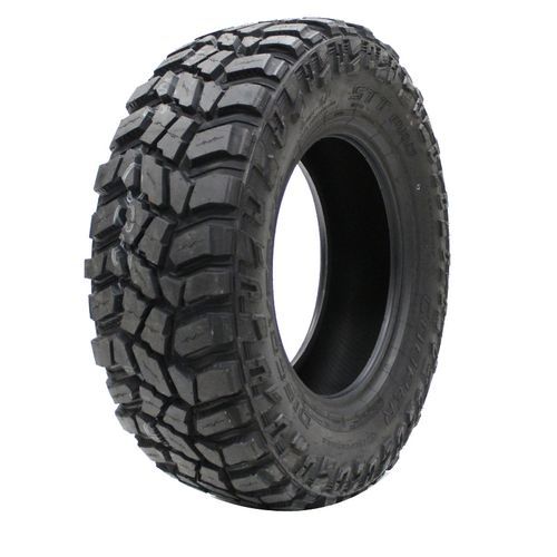 Click to see more a close up of a cooper stt pro tire on a white background .