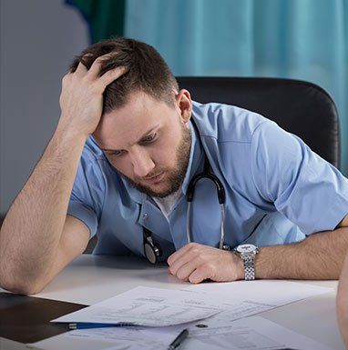 Medical Negligence Victim — Worried Doctor in Chicago, IL