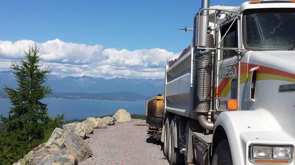 Truck laying gravel