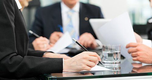 Attorney signing documents in High Point, NC