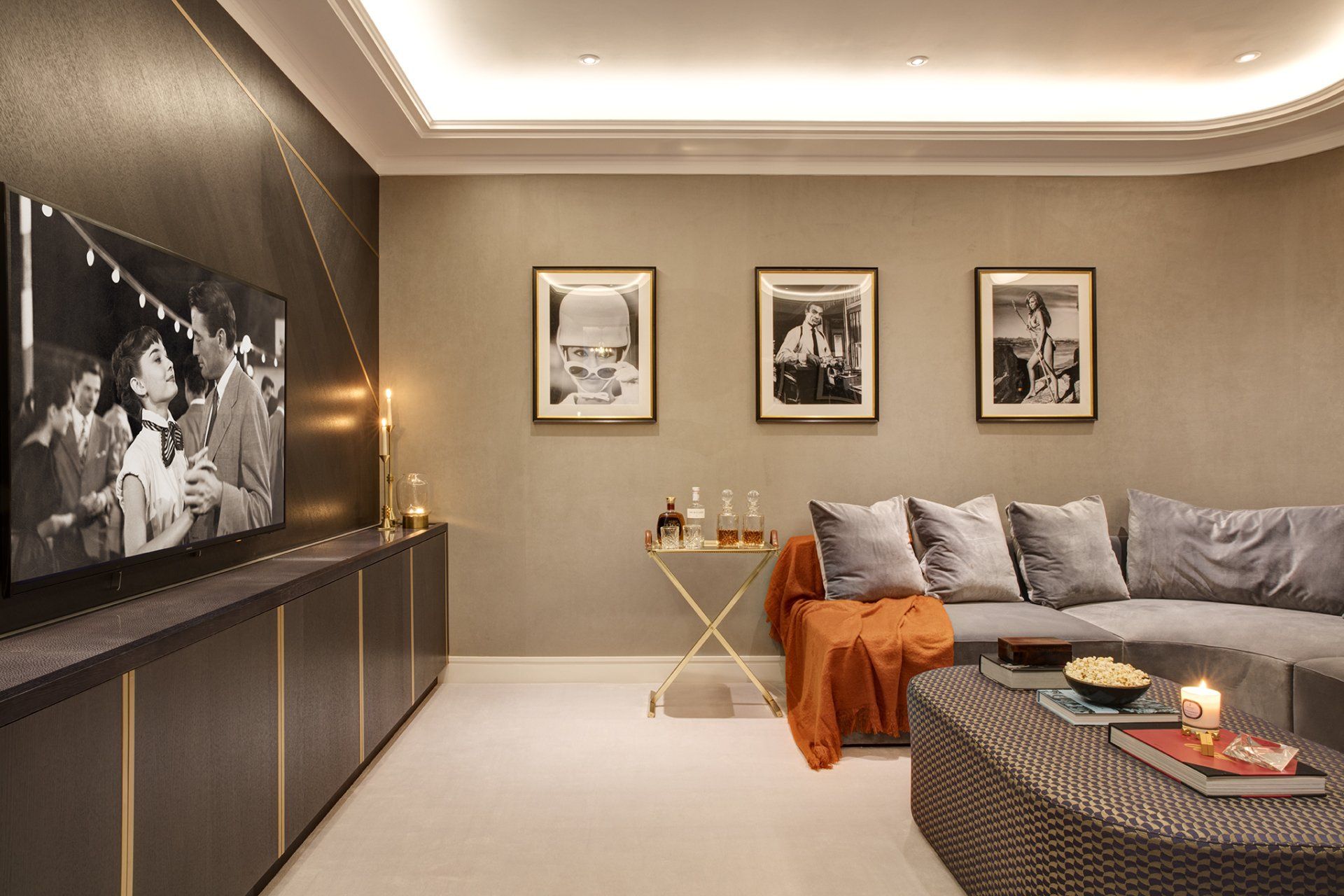 A living room with a couch and a flat screen tv