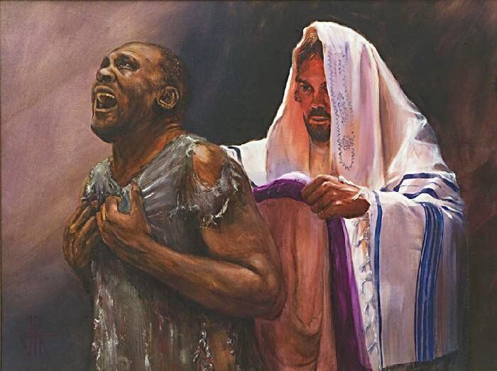Man in tattered clothes being embraced by a figure in white robes, purple sash. Dark background.