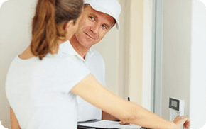 Electrician discussing a survey with a client