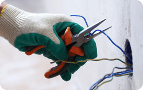 rewiring of an electrical socket being completed