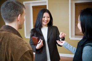 Realtor giving key