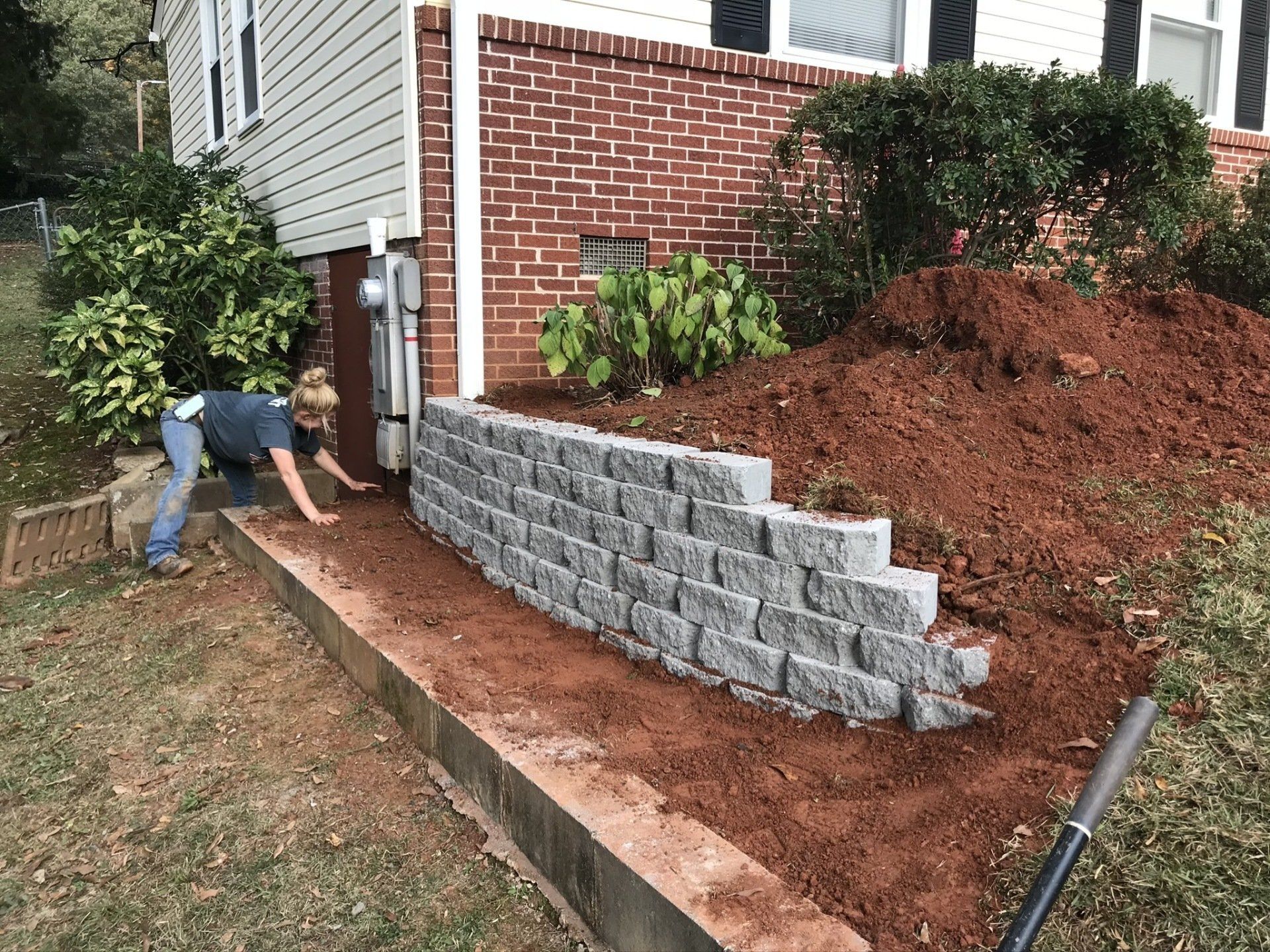 Retaining Wall Securing Garden on Side of Home