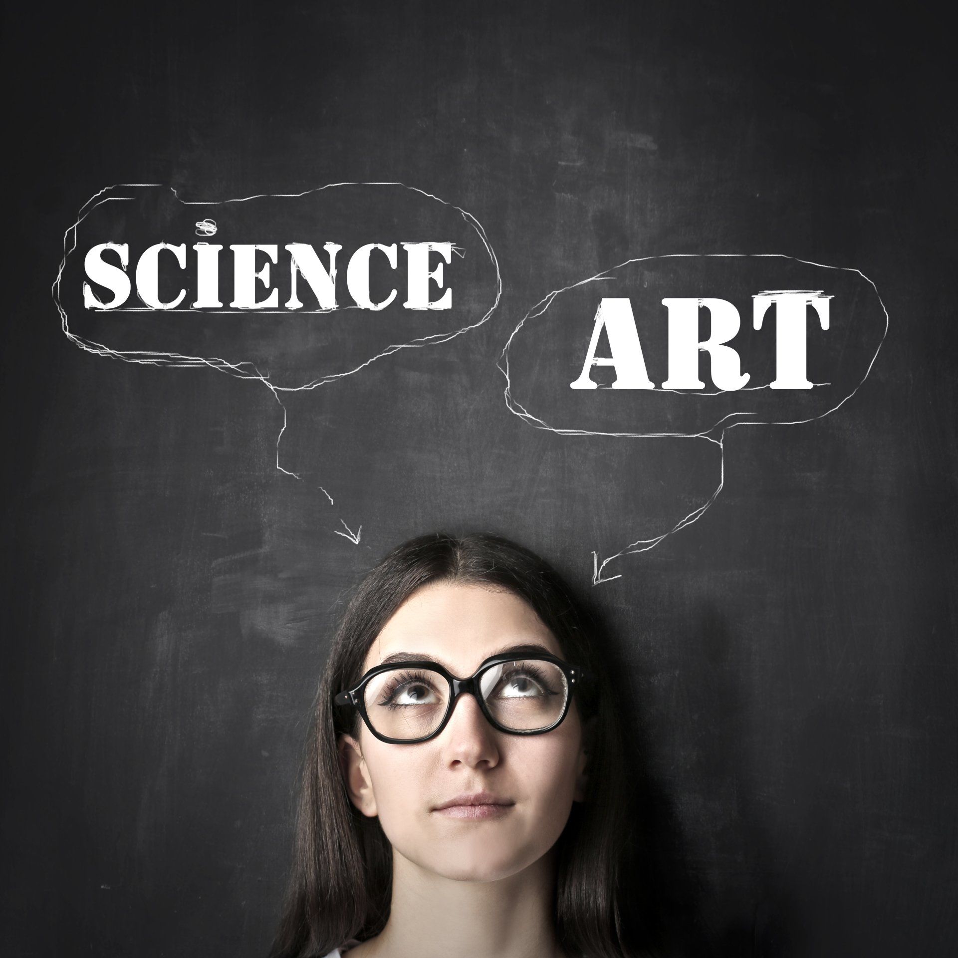 A woman with glasses is thinking about science and art