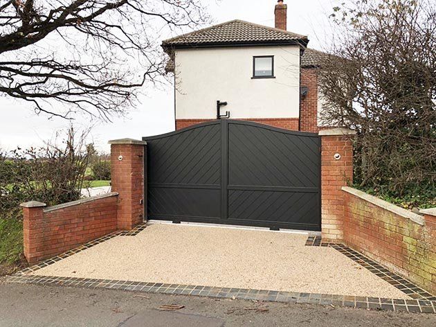 aluminium painted gate at the front of a property