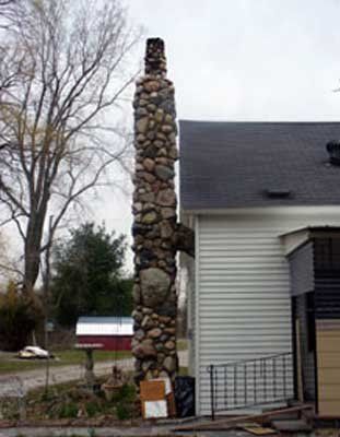Stone Chimney — St. Charles, MI — Nader's Masonry, Inc. Stone Chimney — St. Charles, MI — Nader's Masonry, Inc.