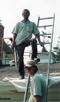 Two Men On The Ladder — St. Charles, MI — Nader's Masonry, Inc. Two Men On The Ladder — St. Charles, MI — Nader's Masonry, Inc.