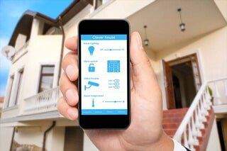 hand holding cellphone — commercial audio systems in Fort Walton Beach, FL hand holding cellphone — commercial audio systems in Fort Walton Beach, FL