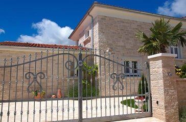Stone house — Gate systems in Fort Walton Beach, FL Stone house — Gate systems in Fort Walton Beach, FL