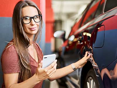 Auto Insurance — Woman with Scratched Car in Milwaukee, WI